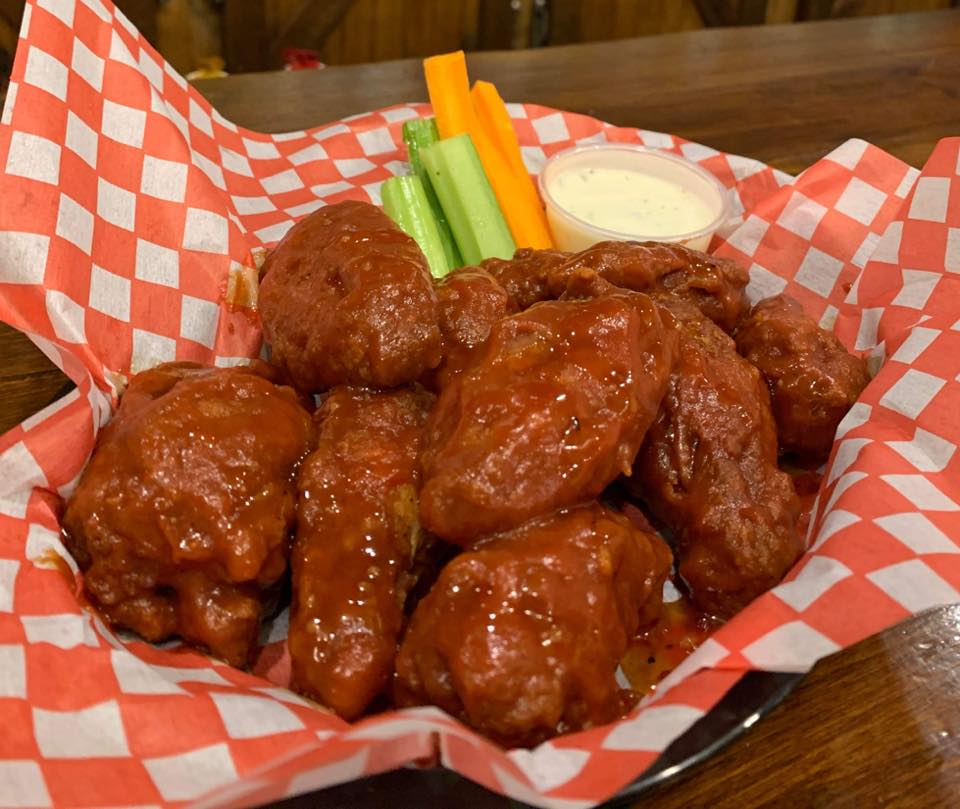 A plate full of chicken wings