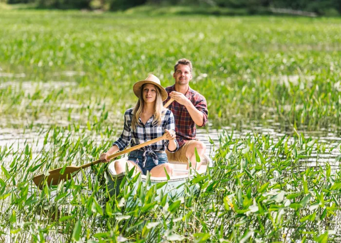 Paddling through marsh