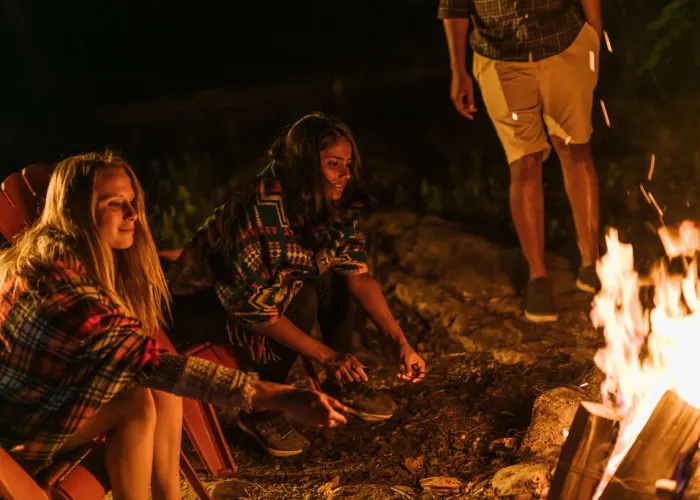 Roasting Marshmellows around the fire while camping in Hastings County, Ontario