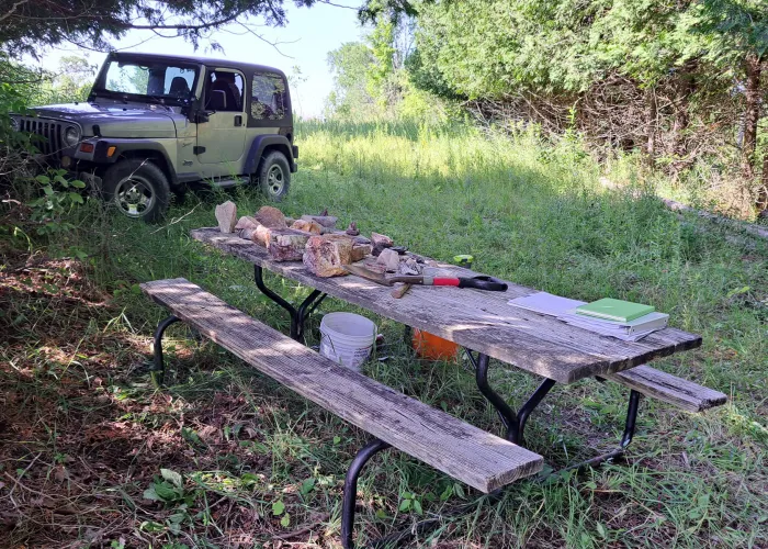 Table with minerals rockhounding at Innisfree Station