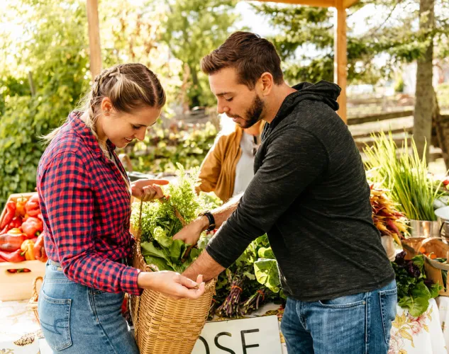 Couple shopping at a Farm Gate for fresh produce in Hastings County, Ontario